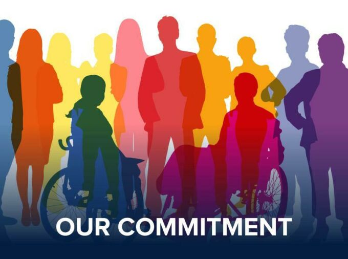 Different colored silhouettes of people with the words "Our Commitment" across the bottom.