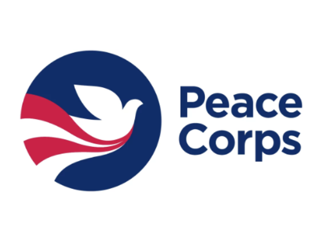 Logo for Peach Corps features a white dove in a dark blue circle with two red and two white ribbons underneath the dove outline